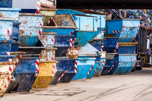 Front of a commercial waste collection vehicle by a business premises