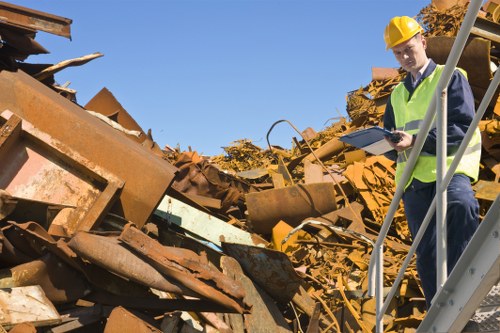 Workers loading mixed commercial waste into a vehicle in Belmont