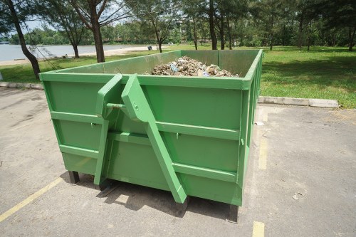 Workers sorting recyclables at a local transfer station