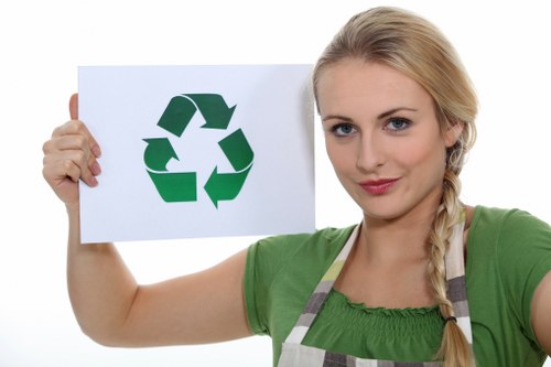 Expert gardeners performing garden clearance